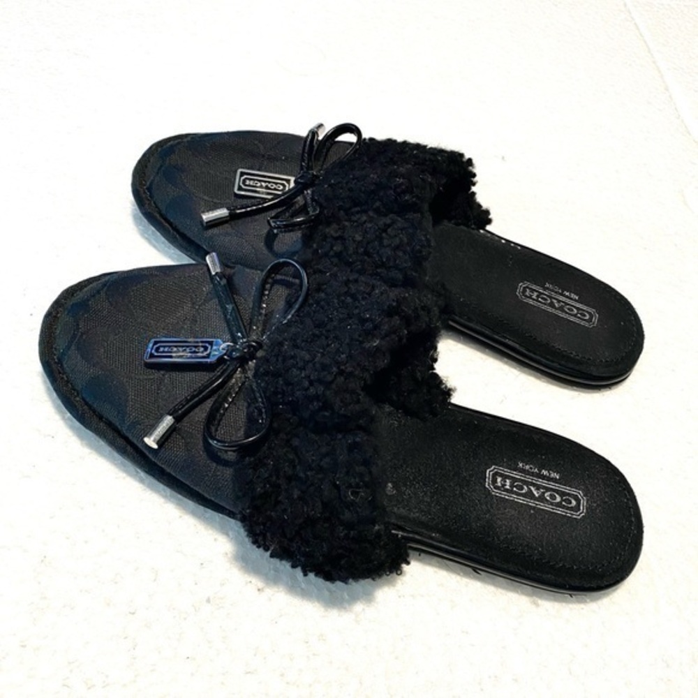 Coach black slip on  size 5.5
